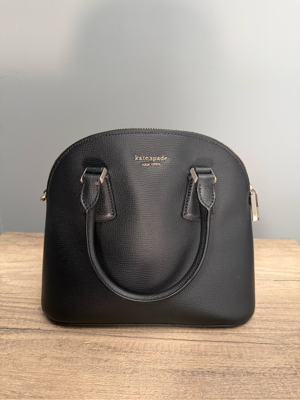 kate spade black pebbled dome satchel with gold hardware